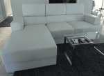 Современный белый диван из натуральной кожи.